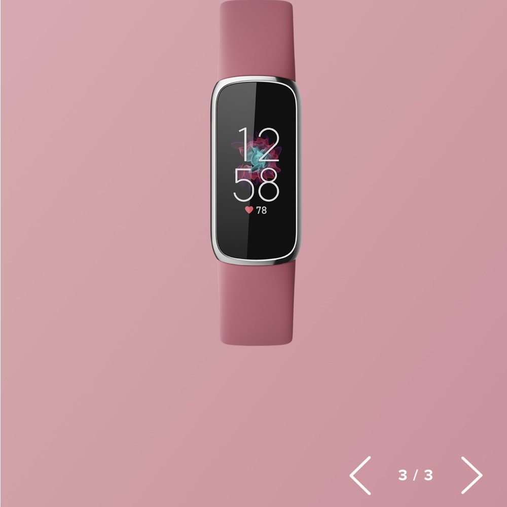 Fitbit Luxe pink band and gold link bracelet. Never used in box with charger.
